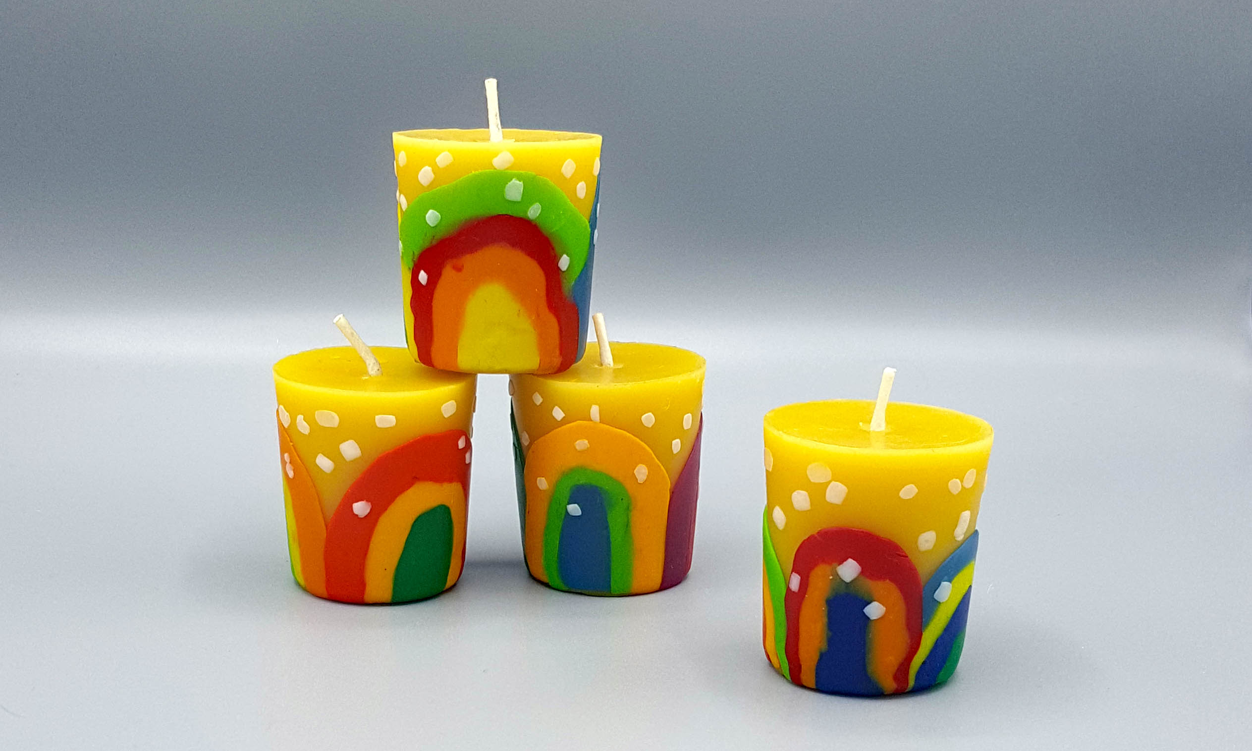 https://www.waldorfsupplies.com/wp-content/uploads/2014/06/rainbow-candles3.jpg